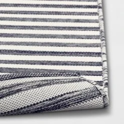 7'x10' Narrow Wornstripe Rectangular Woven Outdoor Area Rug Navy Blue - Threshold™ -Threshold Furnish Shop GUEST 899b548d f416 4892 bc7a 3d8cdcf92d5b