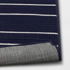 7'x10' Thin Stripe Rectangular Woven Outdoor Area Rug Navy/Ivory - Threshold™ -Threshold Furnish Shop GUEST d8dd5e92 4349 401f 907f d39c6645ef8e